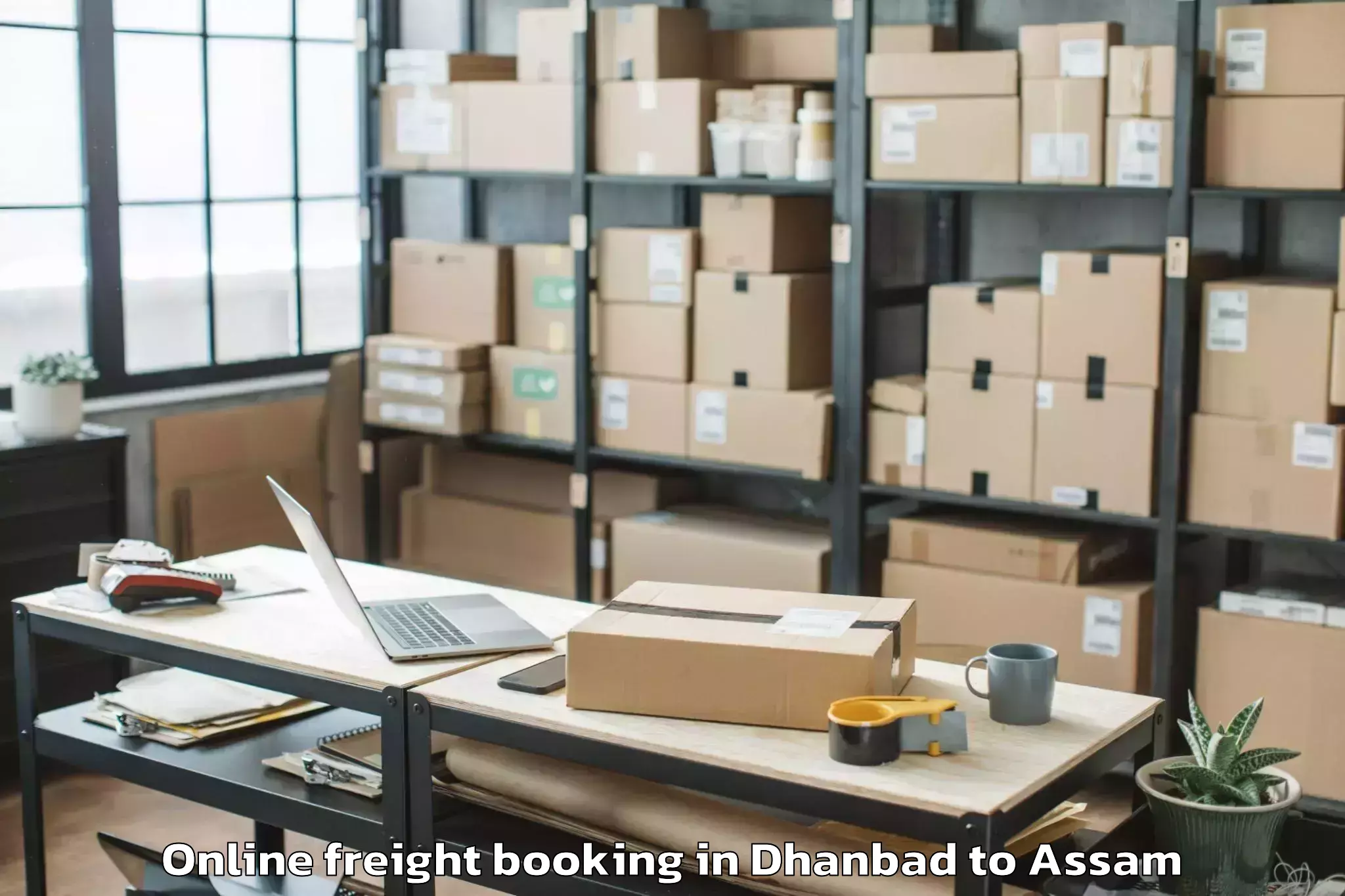 Easy Dhanbad to Guwahati University Online Freight Booking Booking